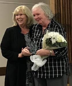 Anne presents the Marilyn Watts award to Janice