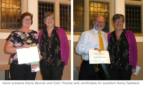 Karen presents Elaine and Colin with their certificates